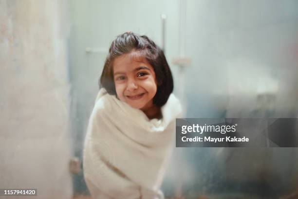 Portrait of a preschool age girl in the bathroom