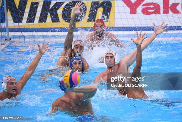 Italy's Vincenzo Dolce throws the ball and scores a goal during the men's final match between Spain and Italy of the water polo event at the 2019...