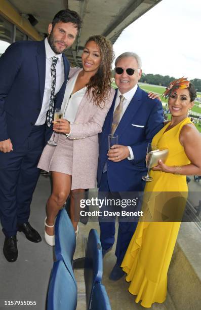 Jonny Hughes, Rebecca Ferguson, Eamonn Holmes and Saira Khan attend the King George Weekend at Ascot Racecourse on July 27, 2019 in Ascot, England.