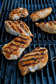 grilled striped chicken on a grill in Sweden