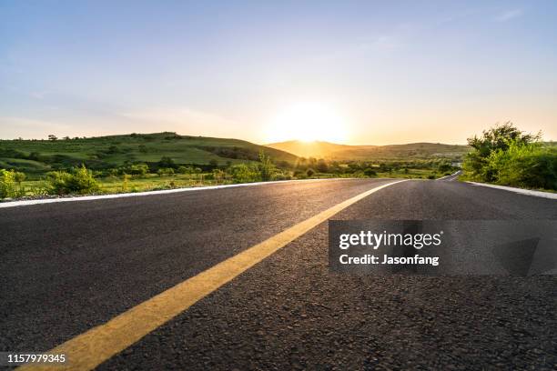 road - sunset landscape stock pictures, royalty-free photos & images