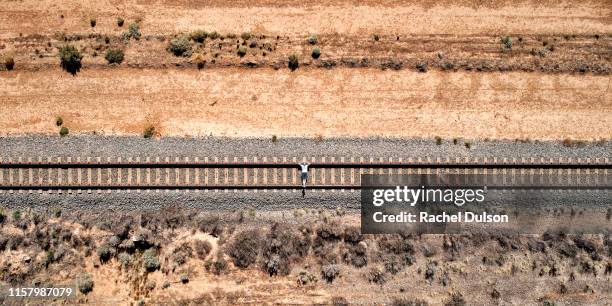 man on train tracks - adelaide aerial stock pictures, royalty-free photos & images