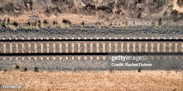 aerial view of train tracks - aerial train stock pictures, royalty-free photos & images