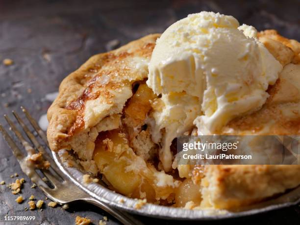 individual size apple pie with vanilla ice cream - apple pie stock pictures, royalty-free photos & images