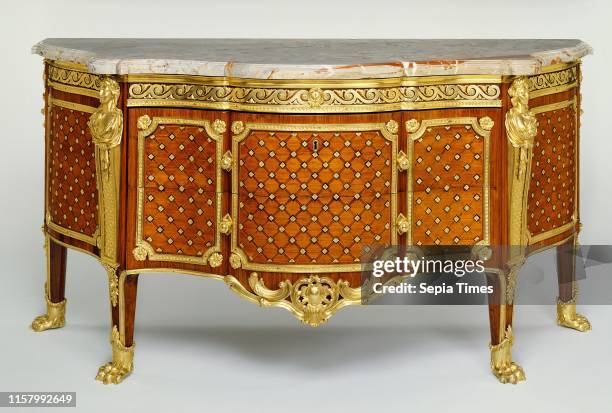 Commode. Gilles Joubert. French. 1689 Paris. France. Europe. 1769. Oak veneered with kingwood. Tulipwood. Holly. Bloodwood. And ebony. Gilt-bronze...