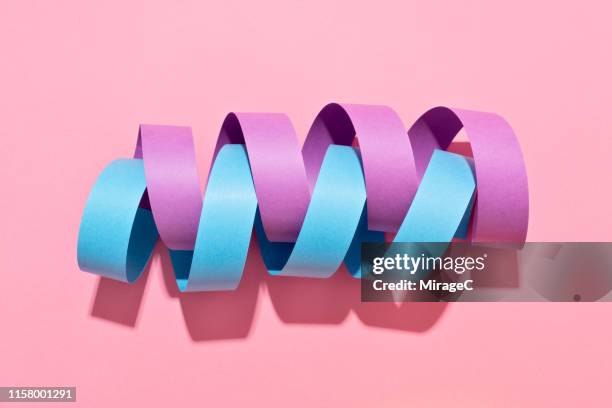 twisted paper stripe helix - converge stockfoto's en -beelden