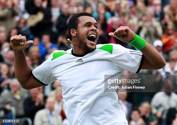 Jo-Wilfred Tsonga of France celebrates after winning his Men's Singles quarter final match against Rafael Nadal of Spain on day five of the AEGON...