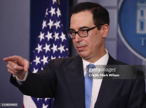 Treasury Secretary Steve Mnuchin briefs reporters on President Donald Trump's newly signed executive order imposing new sanctions on Iran, at the...