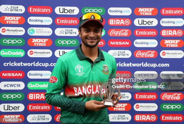 Shakib Al Hasan of Bangladesh poses with the Man of the Match award during the Group Stage match of the ICC Cricket World Cup 2019 between Bangladesh...