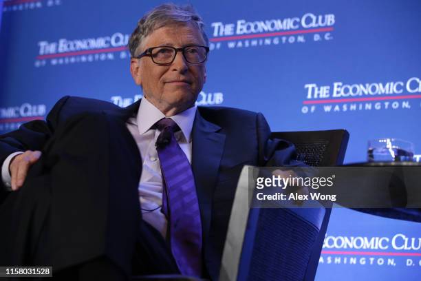 Microsoft principle founder Bill Gates participates in a discussion during a luncheon of the Economic Club of Washington June 24, 2019 in Washington,...