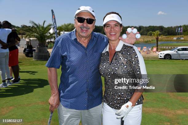 Wolfgang Stumph and Katarina Witt during the 12th GRK Golf Charity Masters on July 27, 2019 in Leipzig, Germany.
