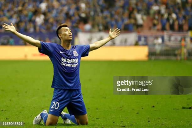 Kim Shin-Wook of Shanghai Shenhua Greenland celebrates after scoring his team's second goal during 2019 China Super League between Shanghai Shenhua...