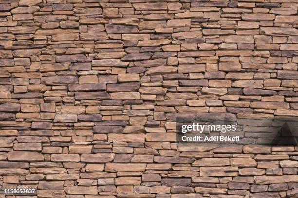 part of a brick wall - stone wall texture 個照片及圖片檔