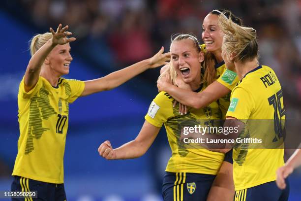 Stina Blackstenius of Sweden celebrates with teammate Kosovare Asllani after scoring her team's first goal during the 2019 FIFA Women's World Cup...