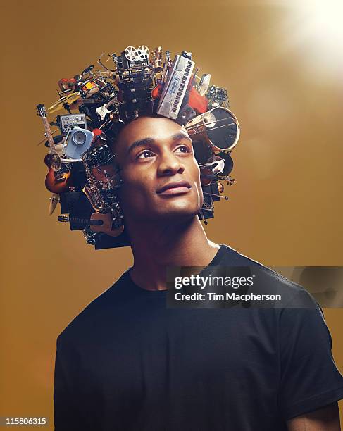 man with afro made from musical equipment - obsessive stockfoto's en -beelden