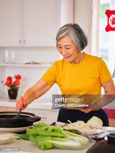 Old Chinese Woman Cooking Photos And Premium High Res Pictures Getty old-chinese-woman-cooking-photos-and-premium-high-res-pictures-getty
