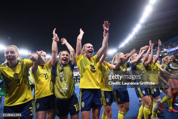 Sweden players celebrate following their sides victory in the 2019 FIFA Women's World Cup France Round Of 16 match between Sweden and Canada at Parc...