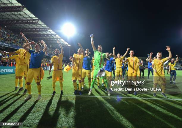 Romania players celebrate after they qualified for the UEFA U-21 semi-finals after drawing 0-0 with France during the 2019 UEFA U-21 Group C match...