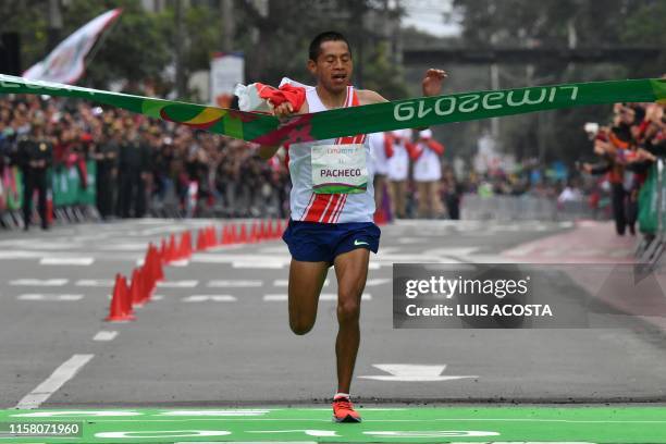 Peru´s Christian Pacheco crosses thefinish line to win the gold medal at the men's Marathon of the Pan-American Games Lima 2019 in Lima, Peru on July...