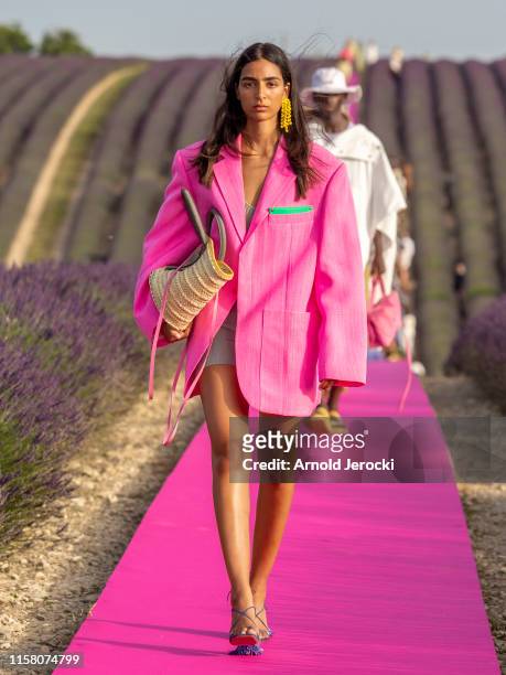 Model walks the runway during the Jacquemus Menswear Spring Summer 2020 show on June 24, 2019 in Valensole, France.