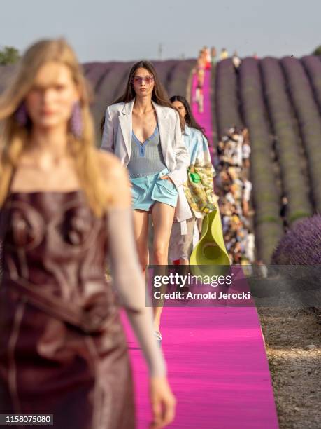 Model walks the runway during the Jacquemus Menswear Spring Summer 2020 show on June 24, 2019 in Valensole, France.