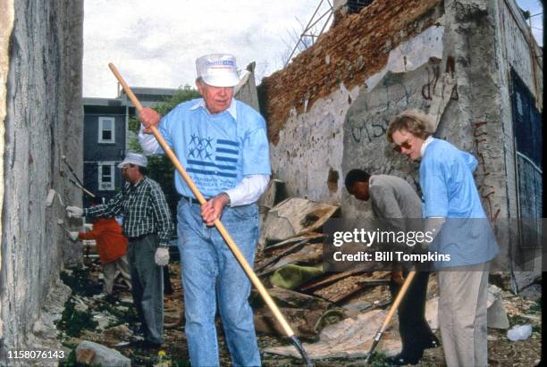 Bill Tompkins/Getty Images Former President Jimmy Carter and former First Lady Rosalyn Carter working with Habitat for Humanity restoring homes May...