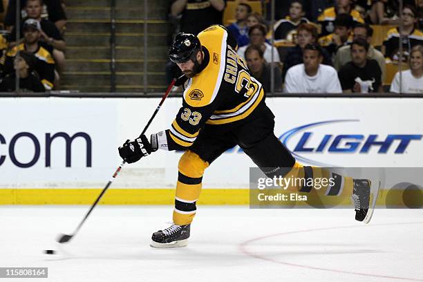 Zdeno Chara of the Boston Bruins takes a shot against the Vancouver Canucks during Game Four of the 2011 NHL Stanley Cup Final at TD Garden on June...