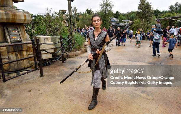 Rey walks around the Resistance side of Black Spire Outpost during the first day without needing a reservation at Star Wars: Galaxy"u2019s Edge...