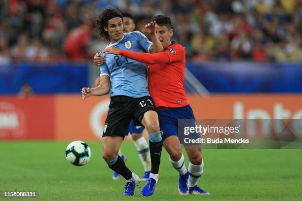 Edinson Cavani of Uruguay competes for the ball with Igor Lichnovsky of Chile during the Copa America Brazil 2019 group C match between Chile and...