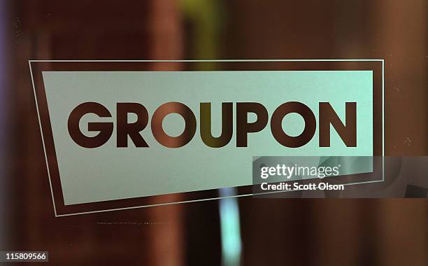 The Groupon logo is displayed in the company's international headquarters on June 10, 2011 in Chicago, Illinois. Groupon, a local e-commerce...