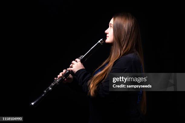 high school female clarinet player - teen musician stock pictures, royalty-free photos & images