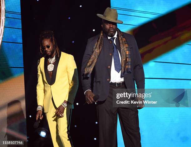 Chainz and Shaquille O'Neal speak onstage during the 2019 NBA Awards presented by Kia on TNT at Barker Hangar on June 24, 2019 in Santa Monica,...