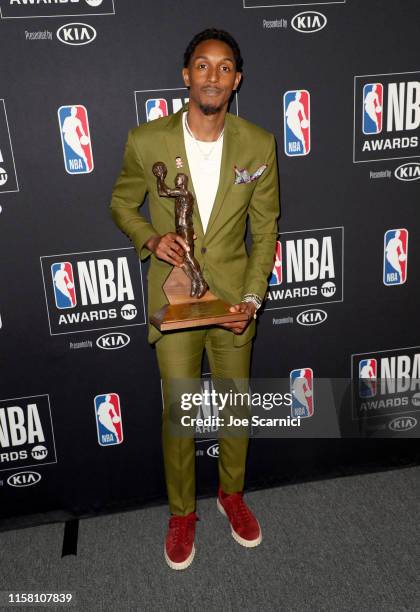 Lou Williams, winner of the Kia NBA Sixth Man of the Year Award, poses in the press room during the 2019 NBA Awards presented by Kia on TNT at Barker...