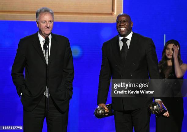 Larry Bird and Magic Johnson accept the Lifetime Achievement Awards onstage during the 2019 NBA Awards presented by Kia on TNT at Barker Hangar on...
