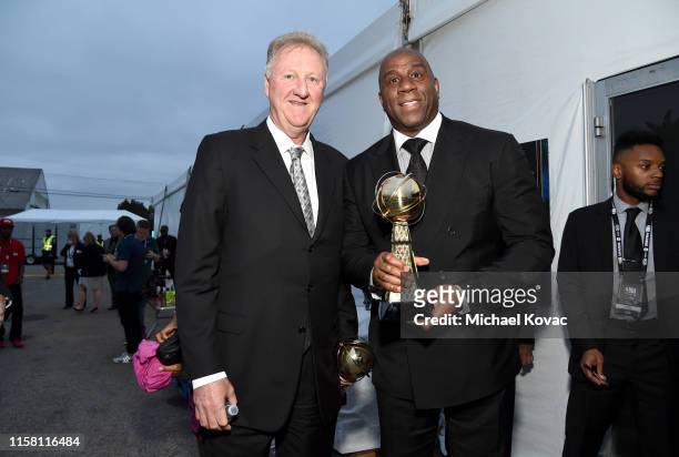 Larry Bird and Magic Johnson, recipients of the Lifetime Achievement Awards, attend the 2019 NBA Awards presented by Kia on TNT at Barker Hangar on...