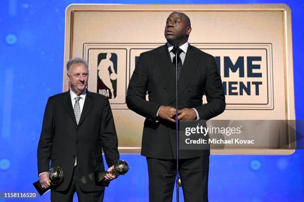 Larry Bird and Magic Johnson accept the Lifetime Achievement Awards onstage during the 2019 NBA Awards presented by Kia on TNT at Barker Hangar on...