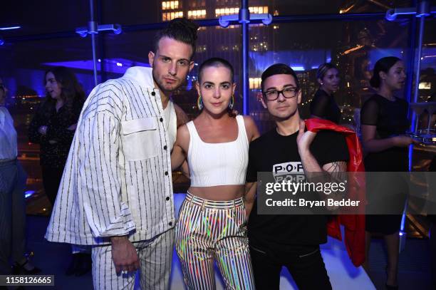 Nico Tortorella, Bethany C. Meyers and Christian Siriano pose for a photo together as Belvedere Vodka x Janelle Monae Celebrate The Launch Of "A...