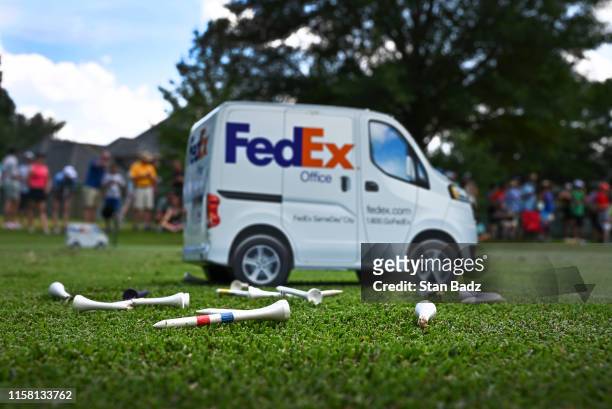 Collection of broken tees are left on the 11th hole during the third round of the World Golf Championships-FedEx St. Jude Invitational at TPC...