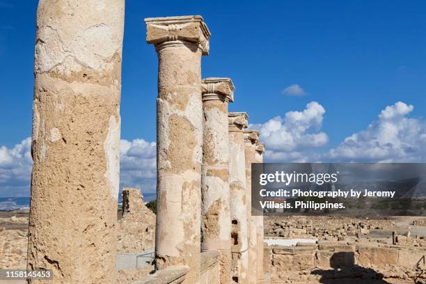 ancient columns, house of theseus, paphos archaeological park - theseus stock pictures, royalty-free photos & images