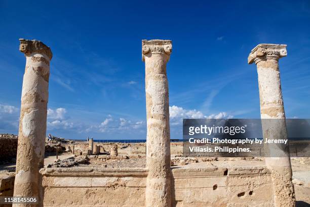 ancient columns, house of theseus, paphos archaeological park - theseus stock pictures, royalty-free photos & images