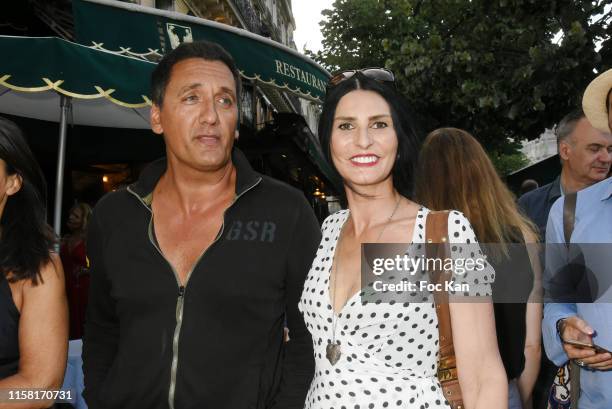 Singer Dany Brillant and Sylvie Ortega Munos attend Tribute to Boris Vian Cocktail at Les Deux Magots on June 24, 2019 in Paris, France.