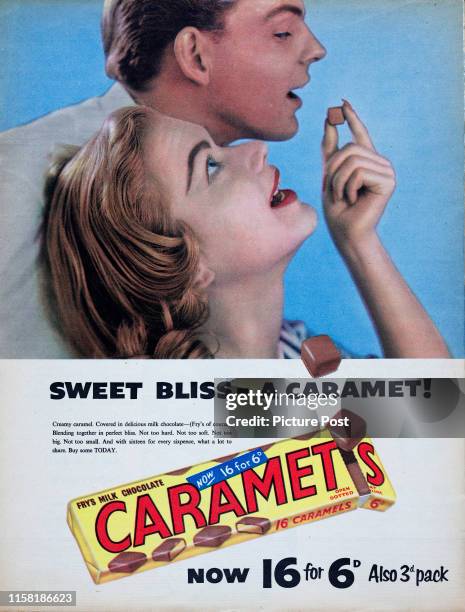 Couple feed each other Fry's Milk Chocolate Caramets chocolates with the caption 'Sweet Bliss - A Caramet!'. Original Publication: Picture Post Ad -...