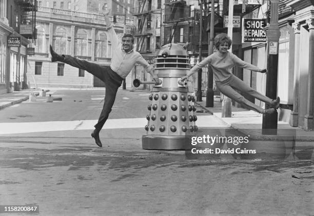 English dancer, singer, comedian, actor, television presenter and musician Roy Castle and English actor Jennie Linden on the set of British science...