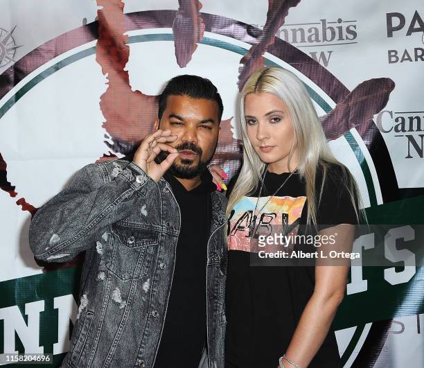 Adrian Dev and Kristi Tucker attend Gary Payton's Cannasports Launch Party held at LA Liason on July 27, 2019 in Los Angeles, California.