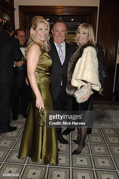 Andrew Neil and guest during Brown's Hotel Re-Opening Party - December 12, 2005 in London, Great Britain.