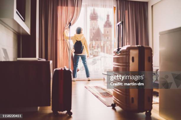 tourist woman staying in luxury hotel - staying in hotel stock pictures, royalty-free photos & images