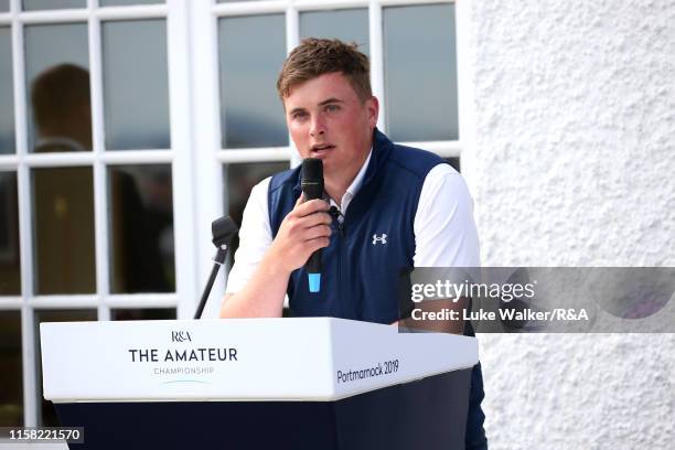 James Sugrue of Ireland winner of the R&A Amateur Championship talks during the trophy presentation during day six of the R&A Amateur Championship at...