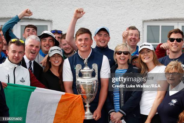 James Sugrue of Ireland winner of the R&A Amateur Championship poses with the trophy during day six of the R&A Amateur Championship at Portmarnock...