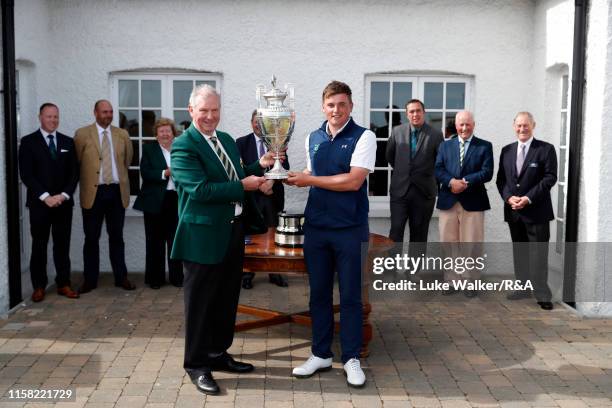 James Sugrue of Ireland winner of the R&A Amateur Championship poses with the trophy during day six of the R&A Amateur Championship at Portmarnock...