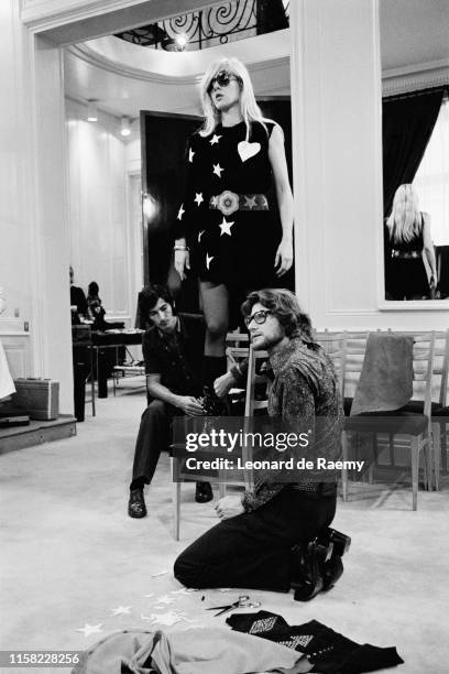 Sylvie Vartan does fashion trials with French high fashion designer Yves Saint Laurent in Paris, France, 1960